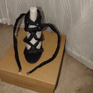 Brand new Steve Madden black strap up heels